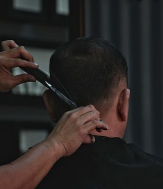 5 Men's Haircuts With Short Sides and a Long Top